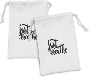 Ambesonne Just Breathe Fabric Pouch Set of 2, Hand Drawn Font Typography Lettering Phrase Words of Wisdom, Small Drawstring Bag for Toiletries Masks and Favors, 9" x 6", Black White