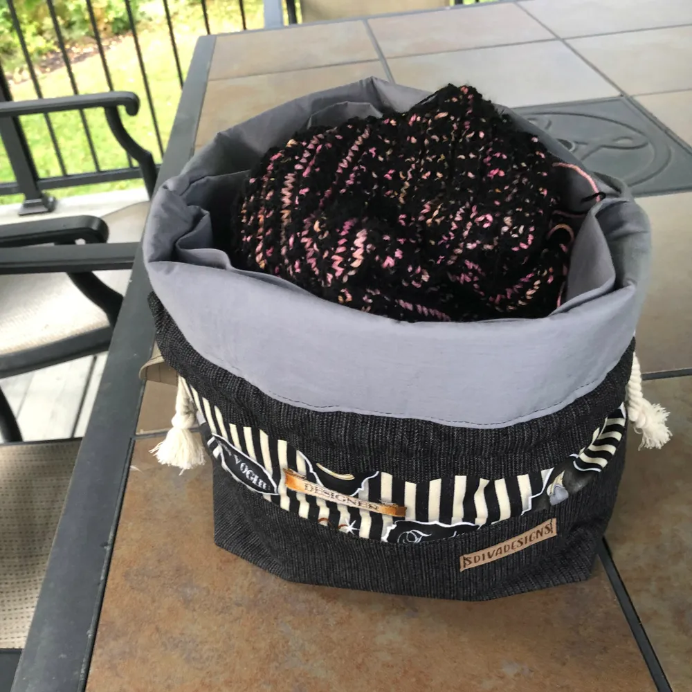 Large drawstring project bag with inner slip pockets and strap handle