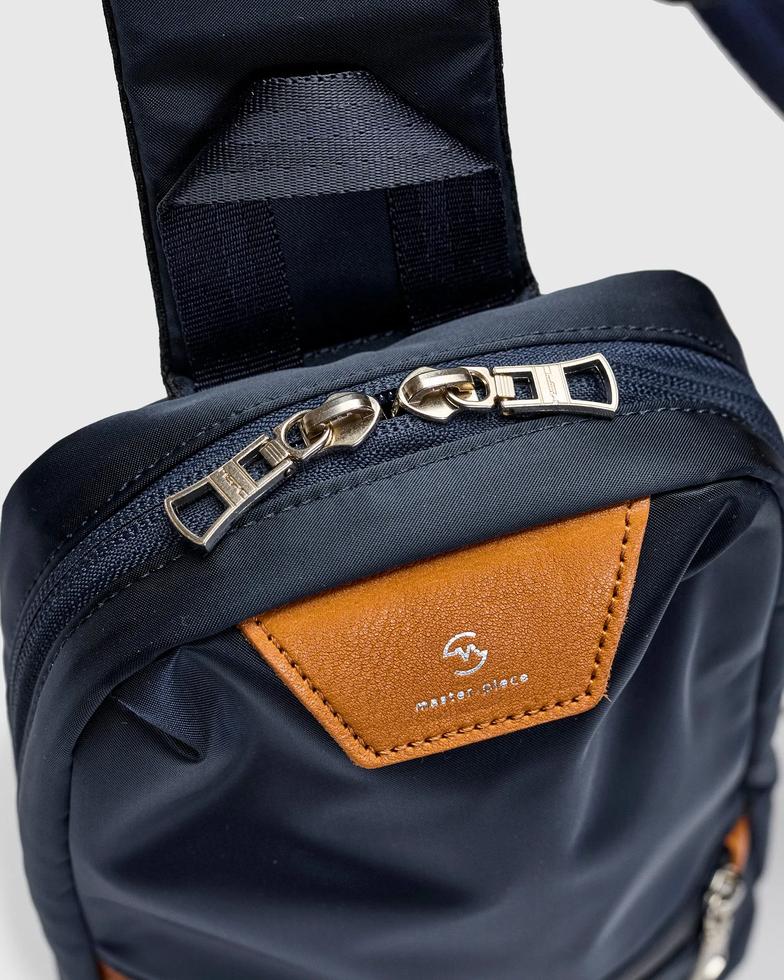 Progress Sling Bag in Navy