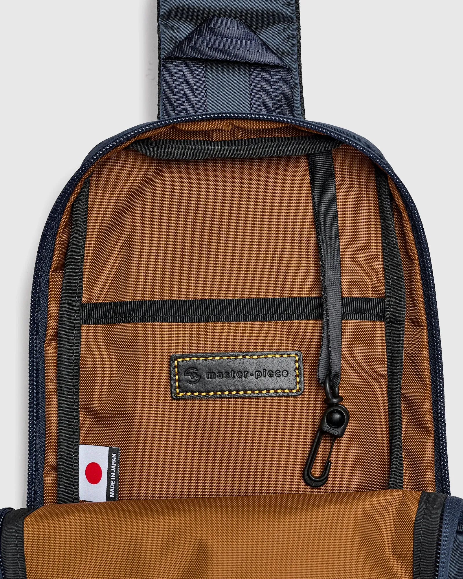 Progress Sling Bag in Navy
