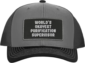 World's Okayest Purification Supervisor - Leather Black Patch Engraved Trucker Hat